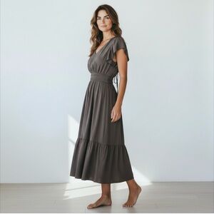 Gap light brown Dress with ruffle bottom and back tie neck. Fitted waist sz M